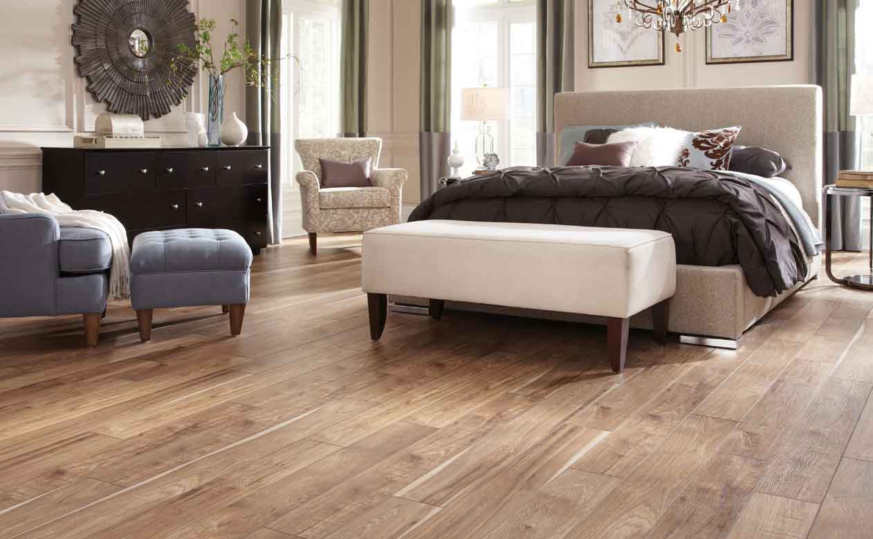Bedroom with wood look tile flooring in Aberdeen, WA 