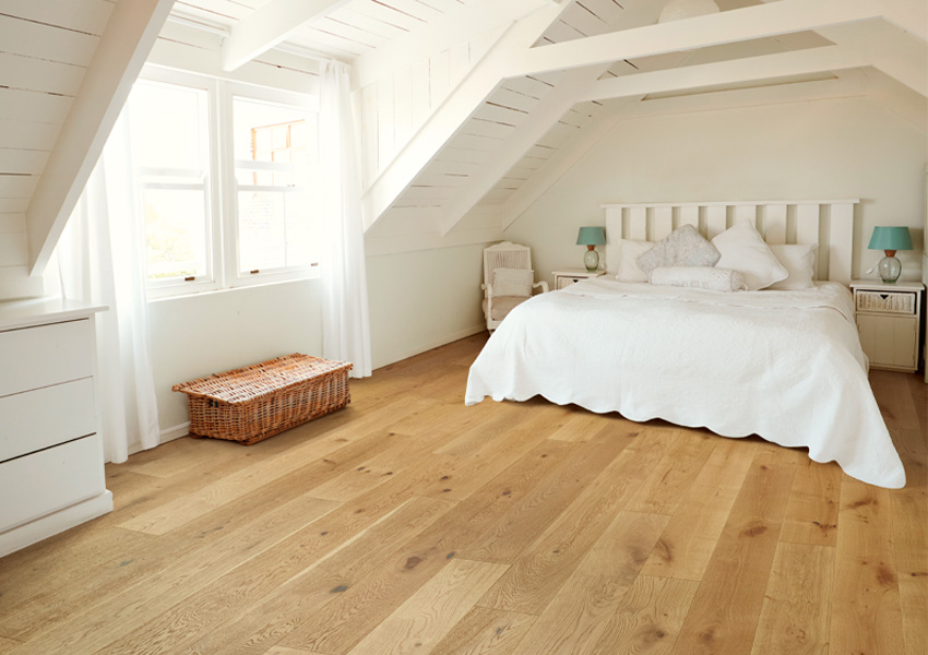 wood flooring in coastal bedroom in beach house.